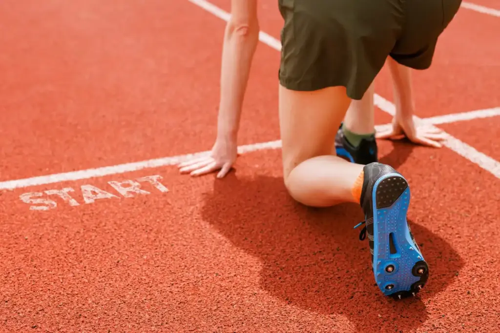 Athlete focused ready to sprint from track start 2026 01 08 23 13 51 utc